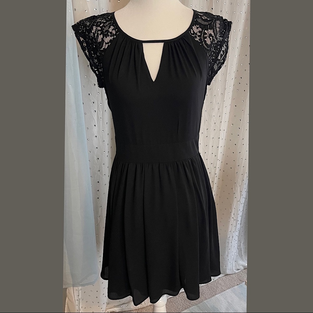 Express accented lace detail a-line flared dress.